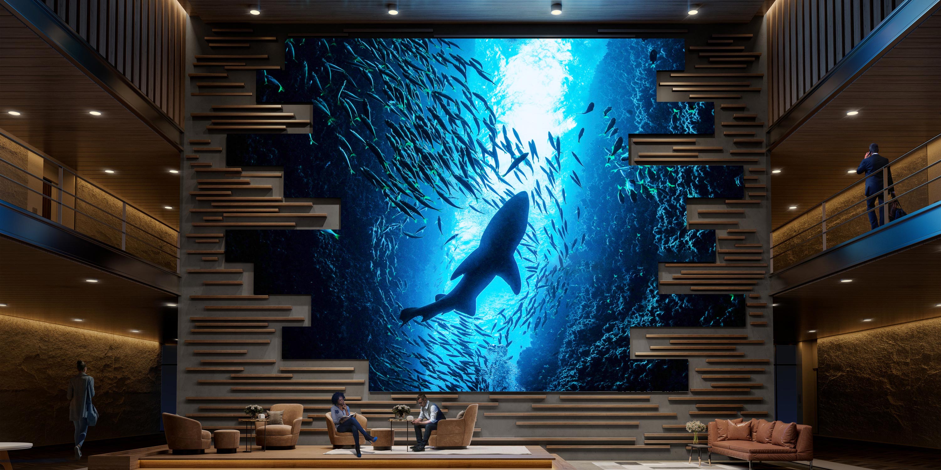 Modern lounge with a large digital sealife-themed video wall