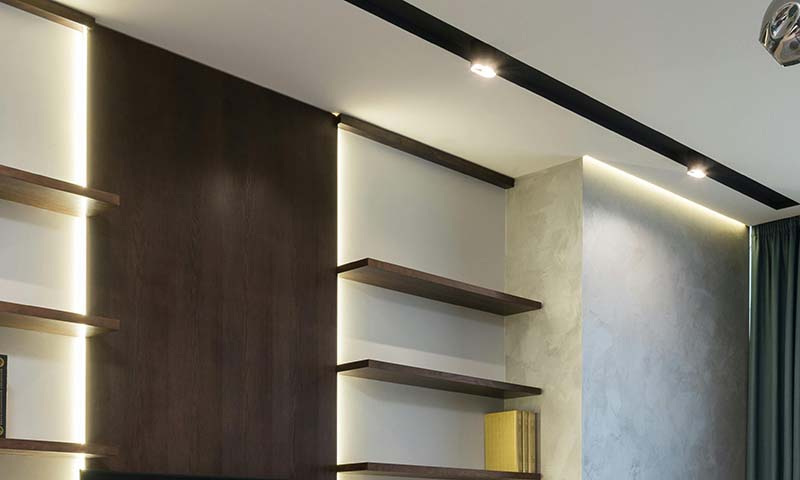 Recessed wall lighting highlighting an architectural niche or shelf