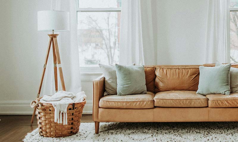 A tall, decorative floor lamp providing ambient light