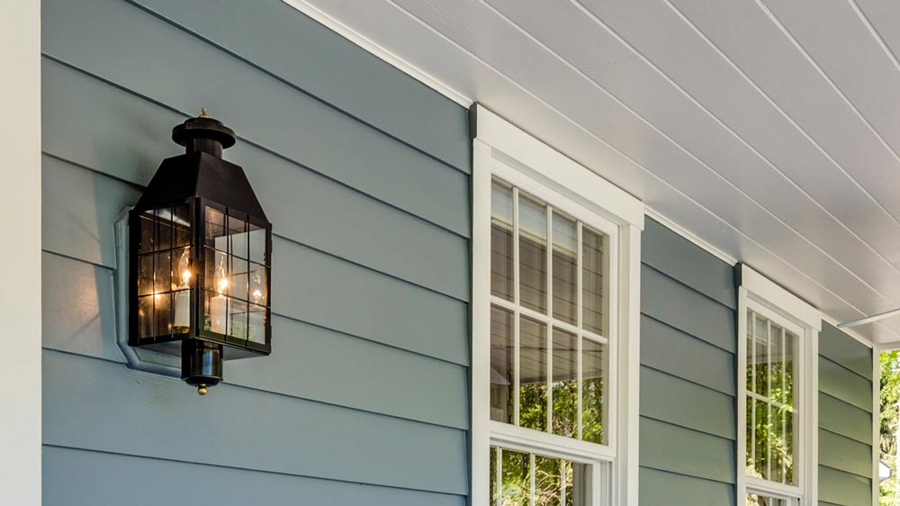 Classic lantern-style porch light illuminating a home entrance