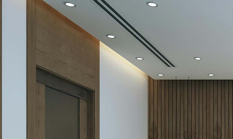 Clean recessed lighting installed into a modern ceiling