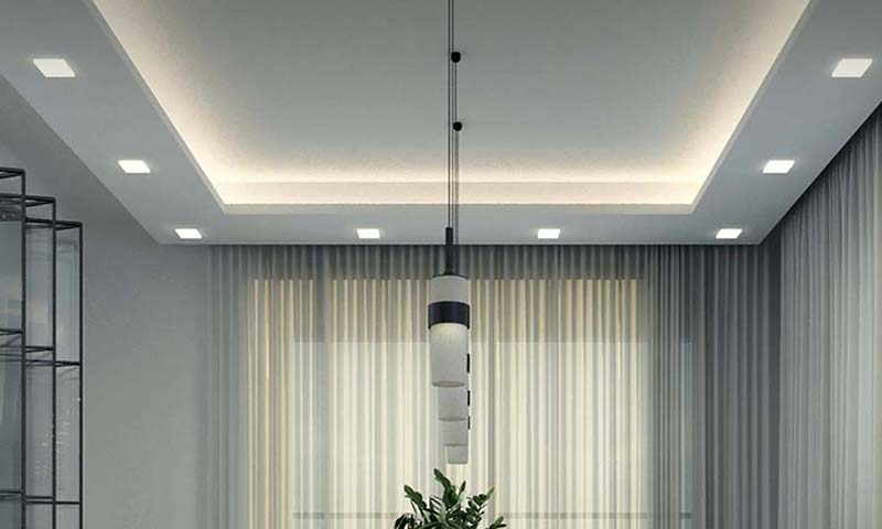 Soft indirect cove lighting installed along a ceiling ledge