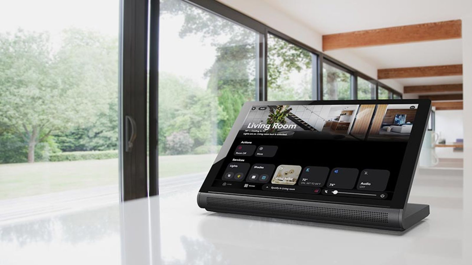 Tablet on a white counter displaying a smart home control interface for a living room