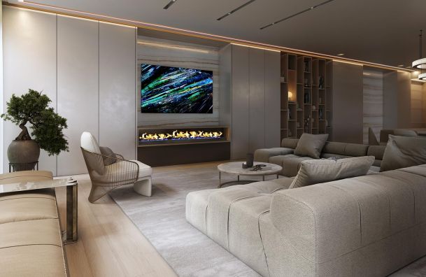 Luxury lounge with a linear fireplace under a television and a large sectional sofa